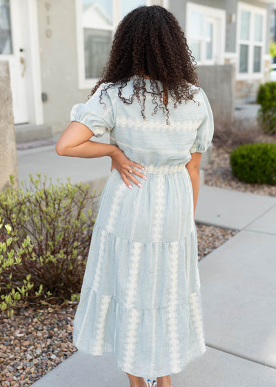 Back view of the light blue embroidered dress