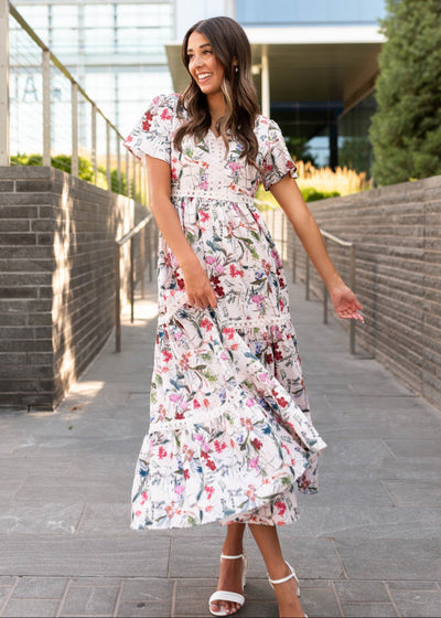 Pink floral tiered dress with lace trim