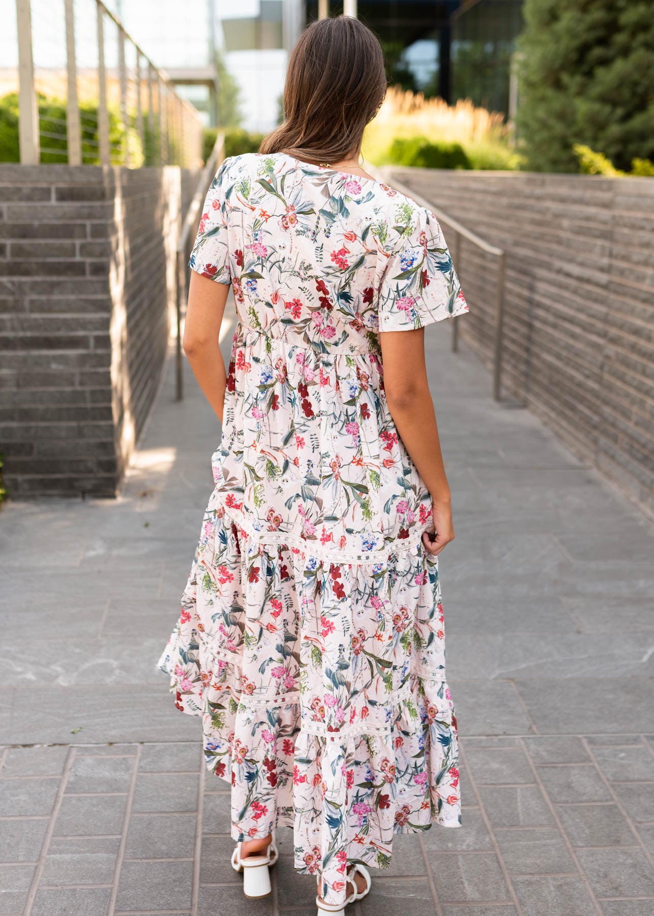 Back view of the pink floral tiered dress