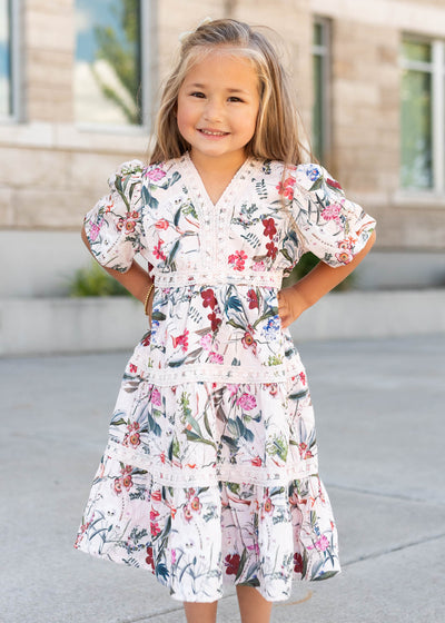 Short sleeve pink floral tiered little girl dress by Lena Lou at Lena Layne