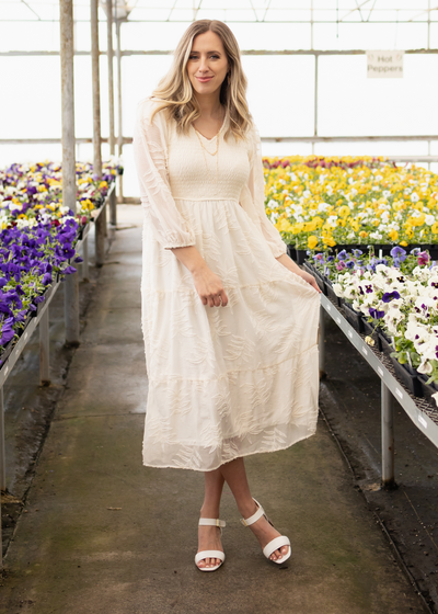 Cream dress with tiered skirt
