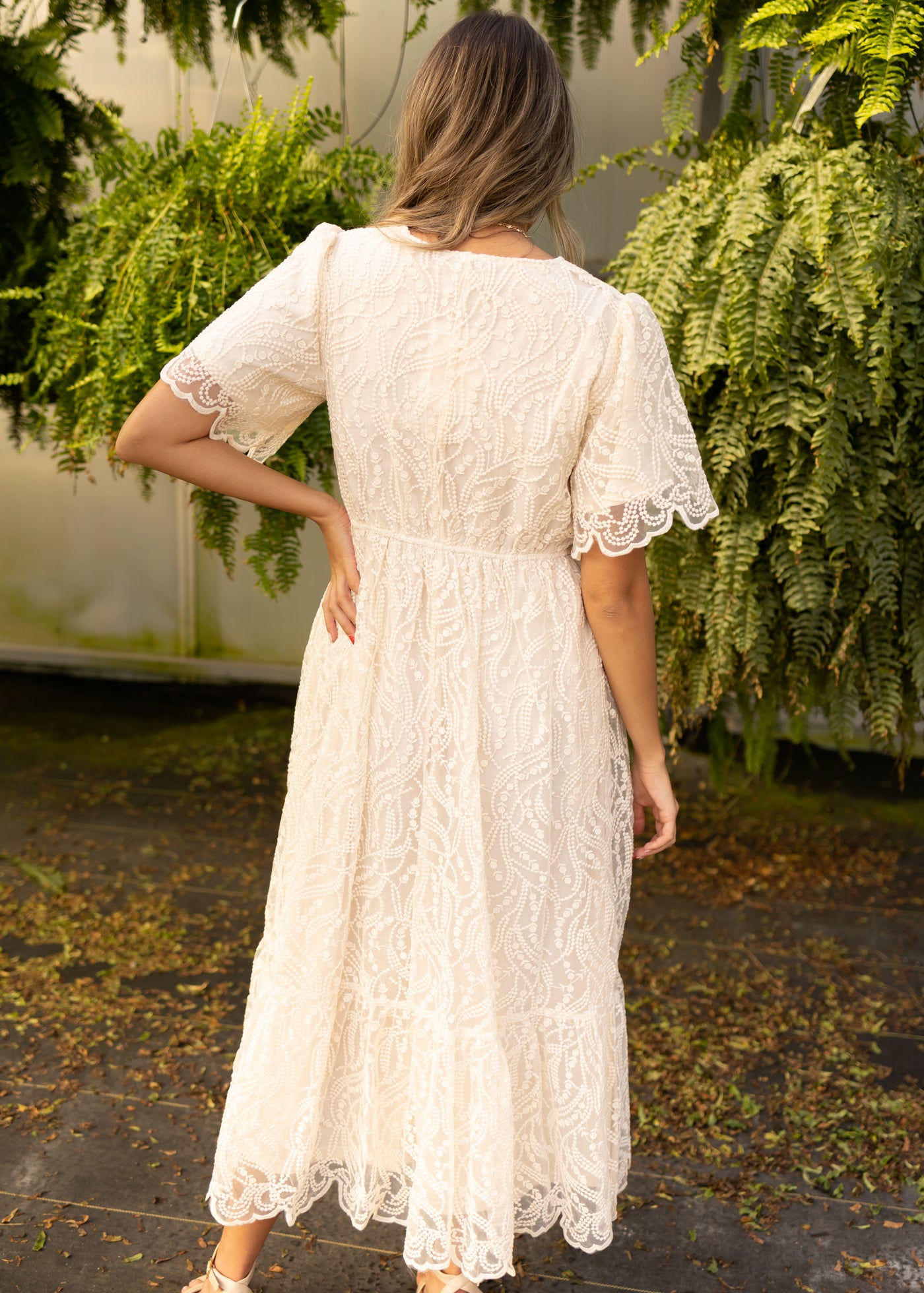 Back view of a cream dress
