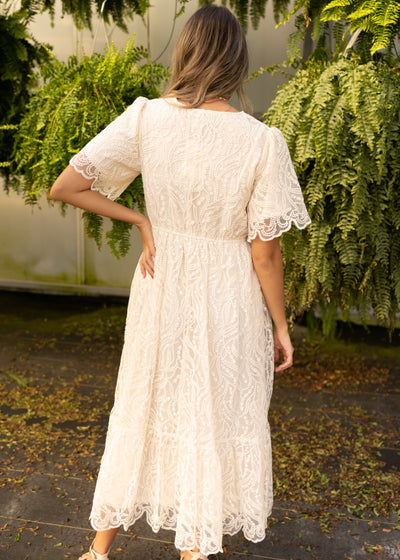 Back view of a cream dress