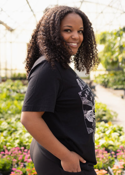 Side view of a black tee
