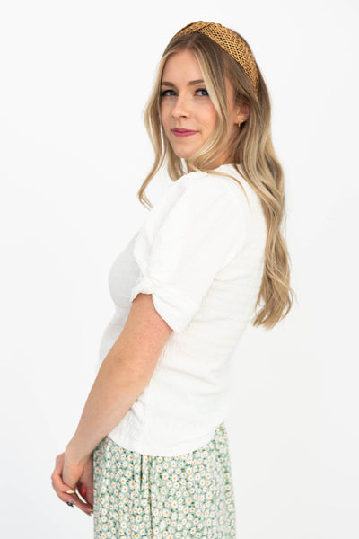 Side view of a white top