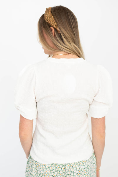 Back view of a white top