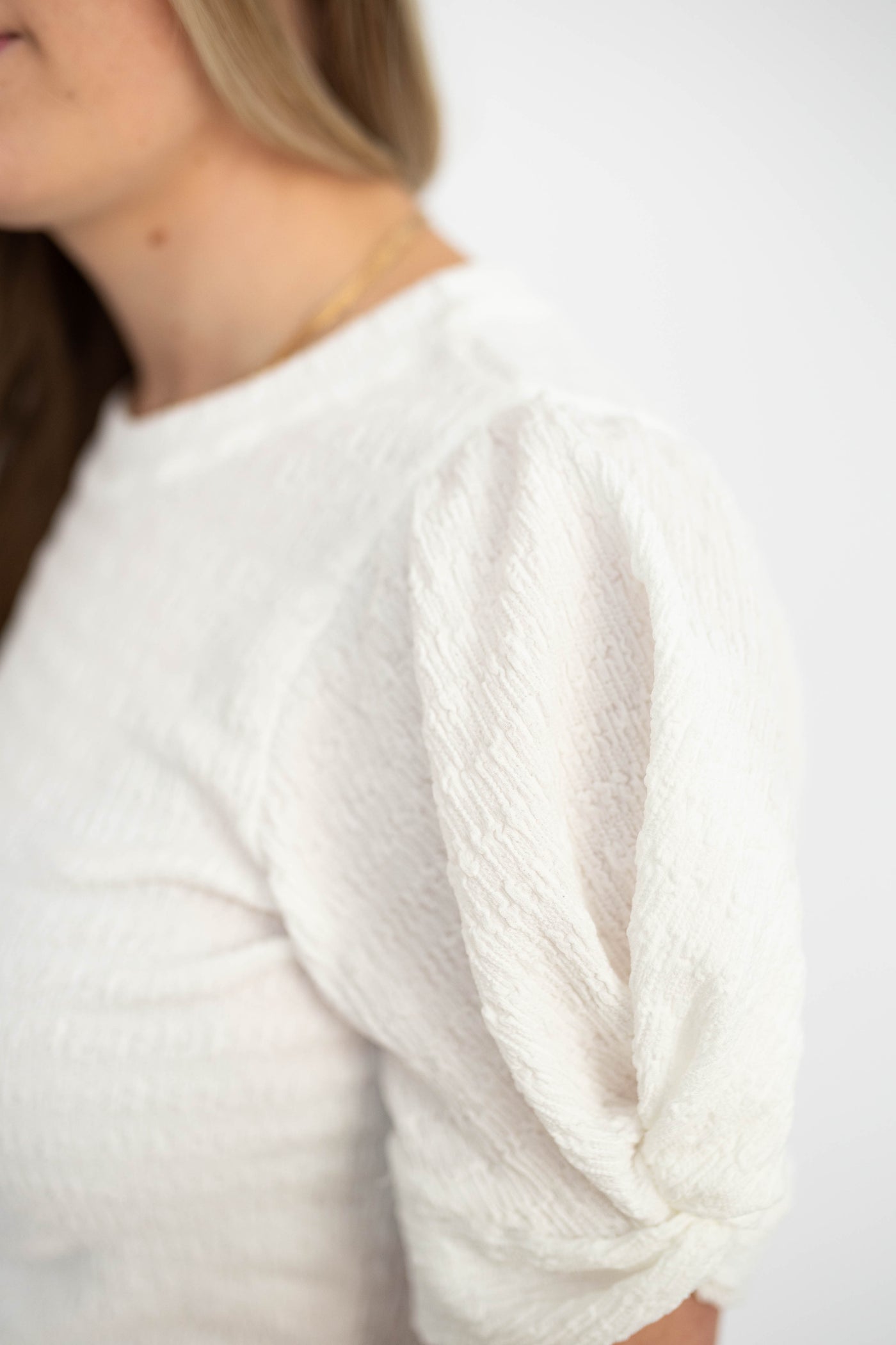 Sleeve of a white top