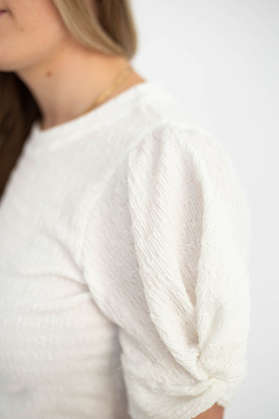 Sleeve of a white top
