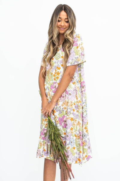 Ivory floral dress with short sleeves and lavender flowers