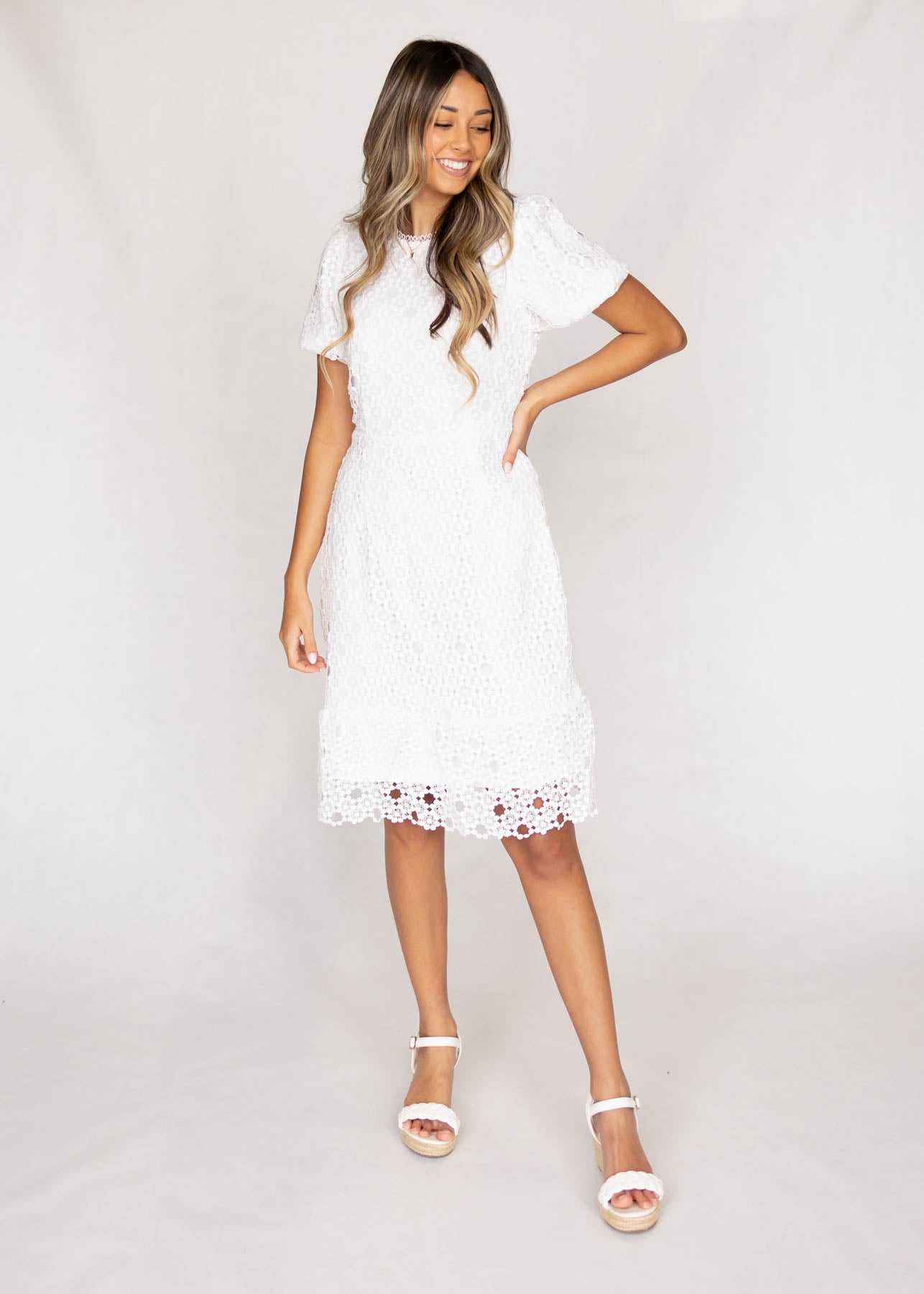 Fitted white lace dress