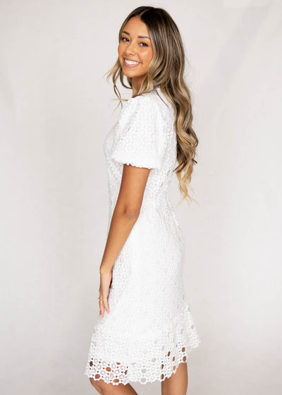 Side view of a short sleeve white lace dress