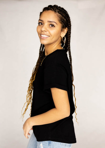Side view of short sleeve black top
