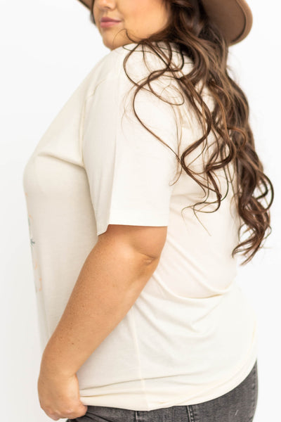 Side view of a plus size rodeo tee