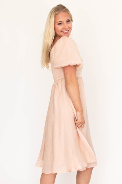 Side view of a dusty pink dress
