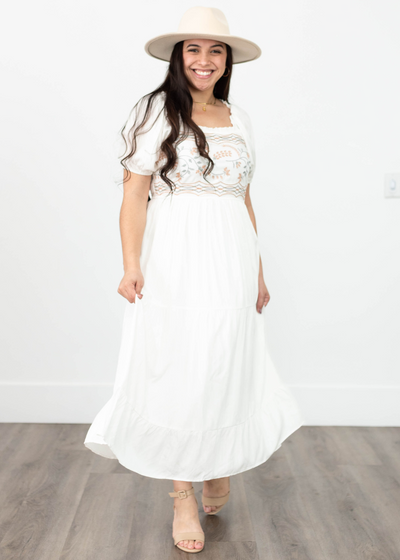 Short sleeve ivory dress with embroidery on the bodice