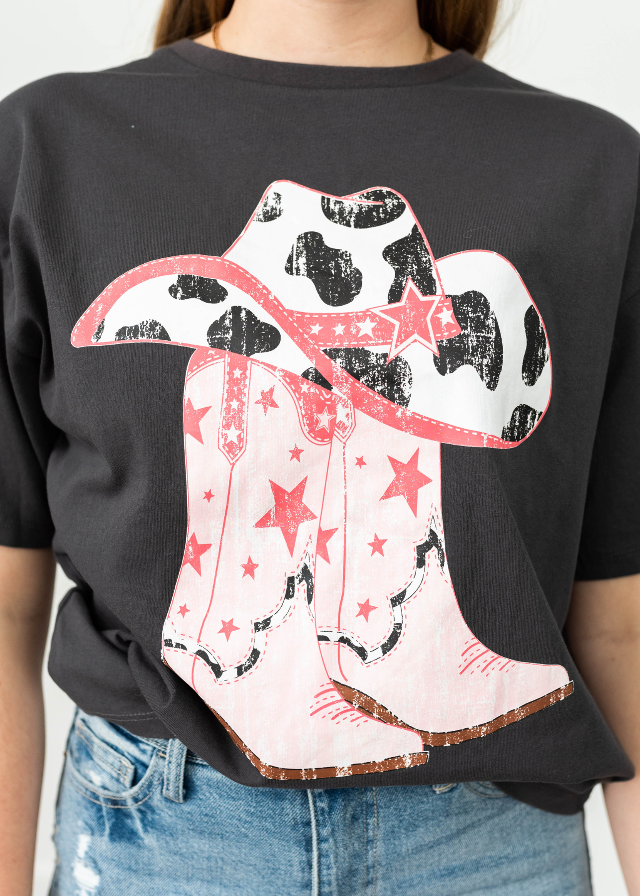 Charcoal top with pink cowboy boots and cowboy hat