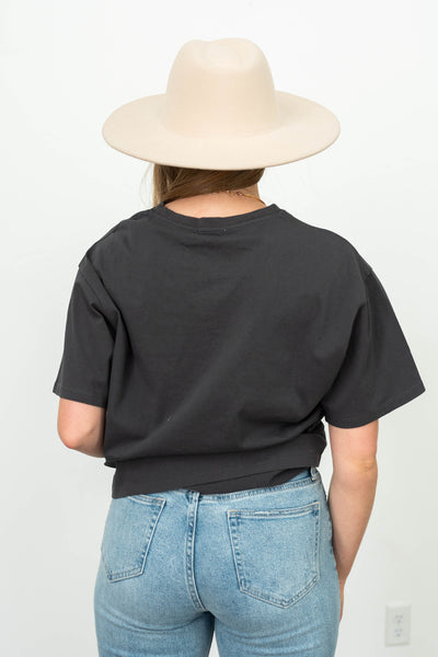 Back view of a charcoal top