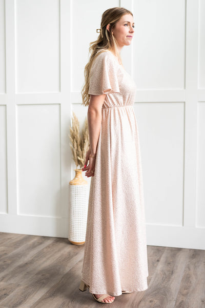 Side view of a champagne dress