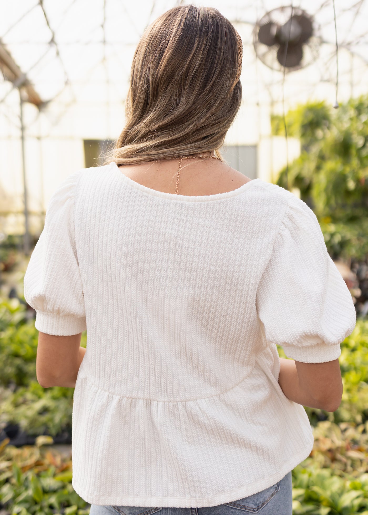 Back view of an ivory top