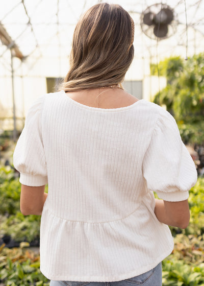 Back view of an ivory top