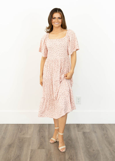 Blush floral dress with tiered skirt