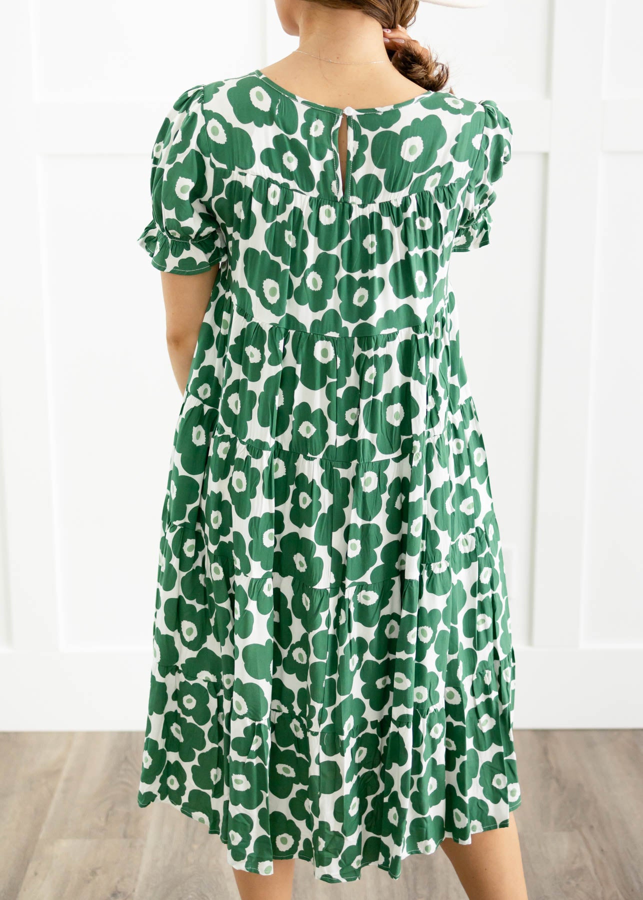Back view of a green floral dress
