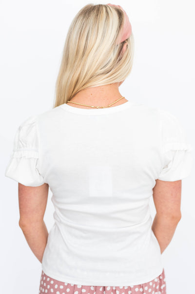 Back view of a small white top