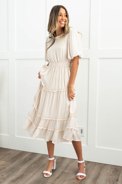 Cream dress with an elastic waist