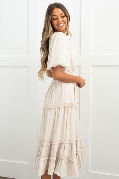 Side view of a cream dress
