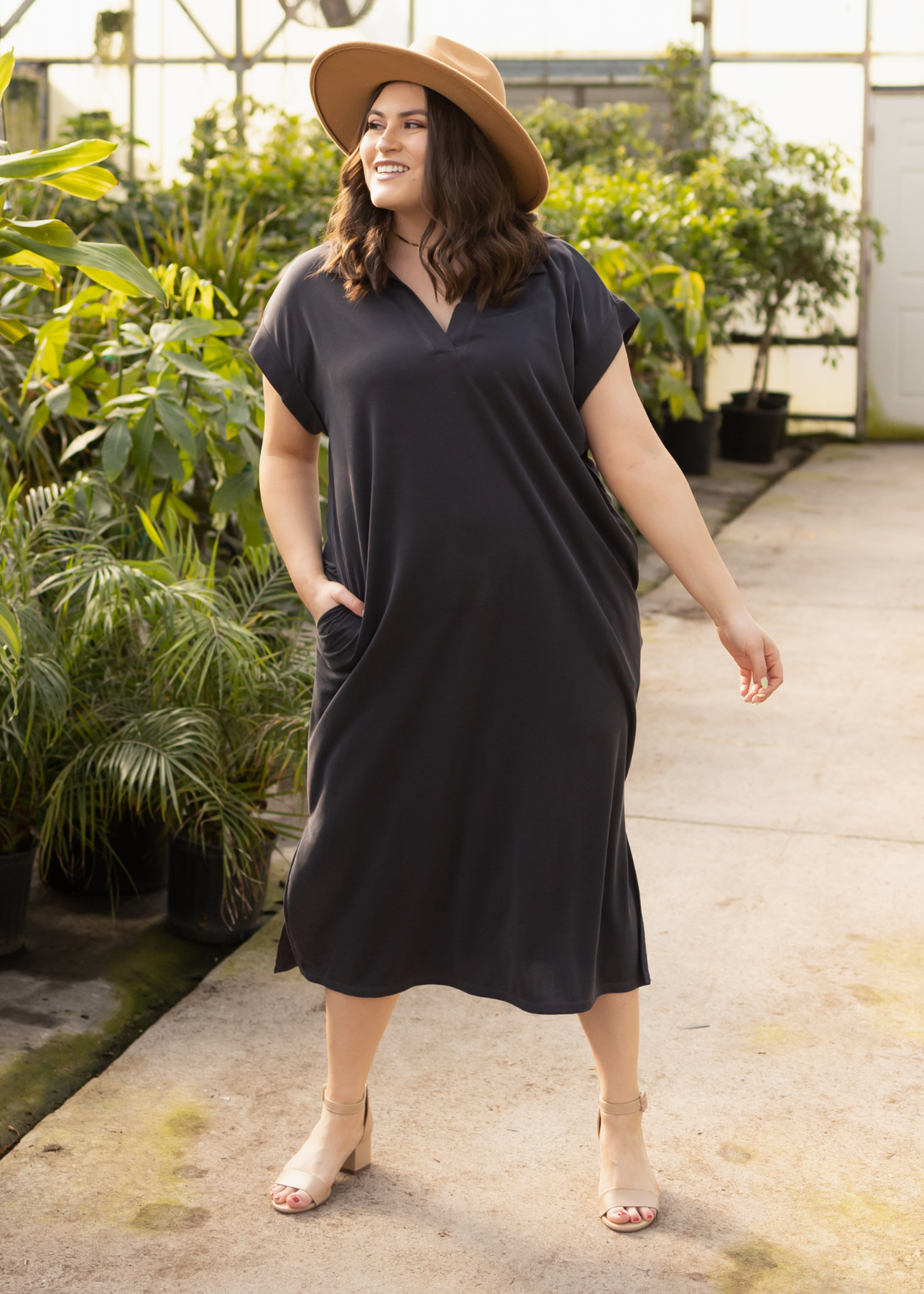 Plus size black dress with pockets