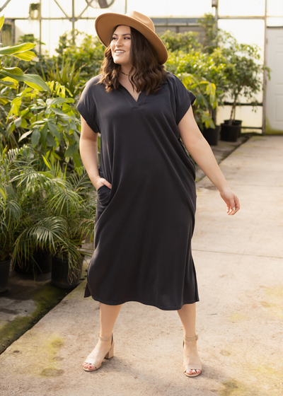 Plus size black dress with pockets