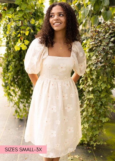 Short sleeve cream floral dress with a square neck
