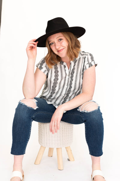 Medium white top with black horizontal pattern