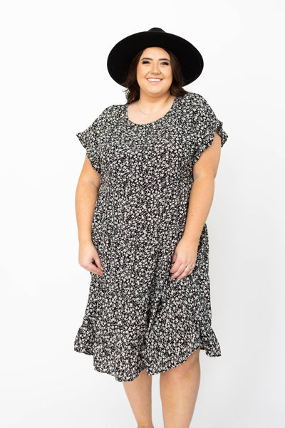 Plus size short sleeve black floral dress with tiered skirt