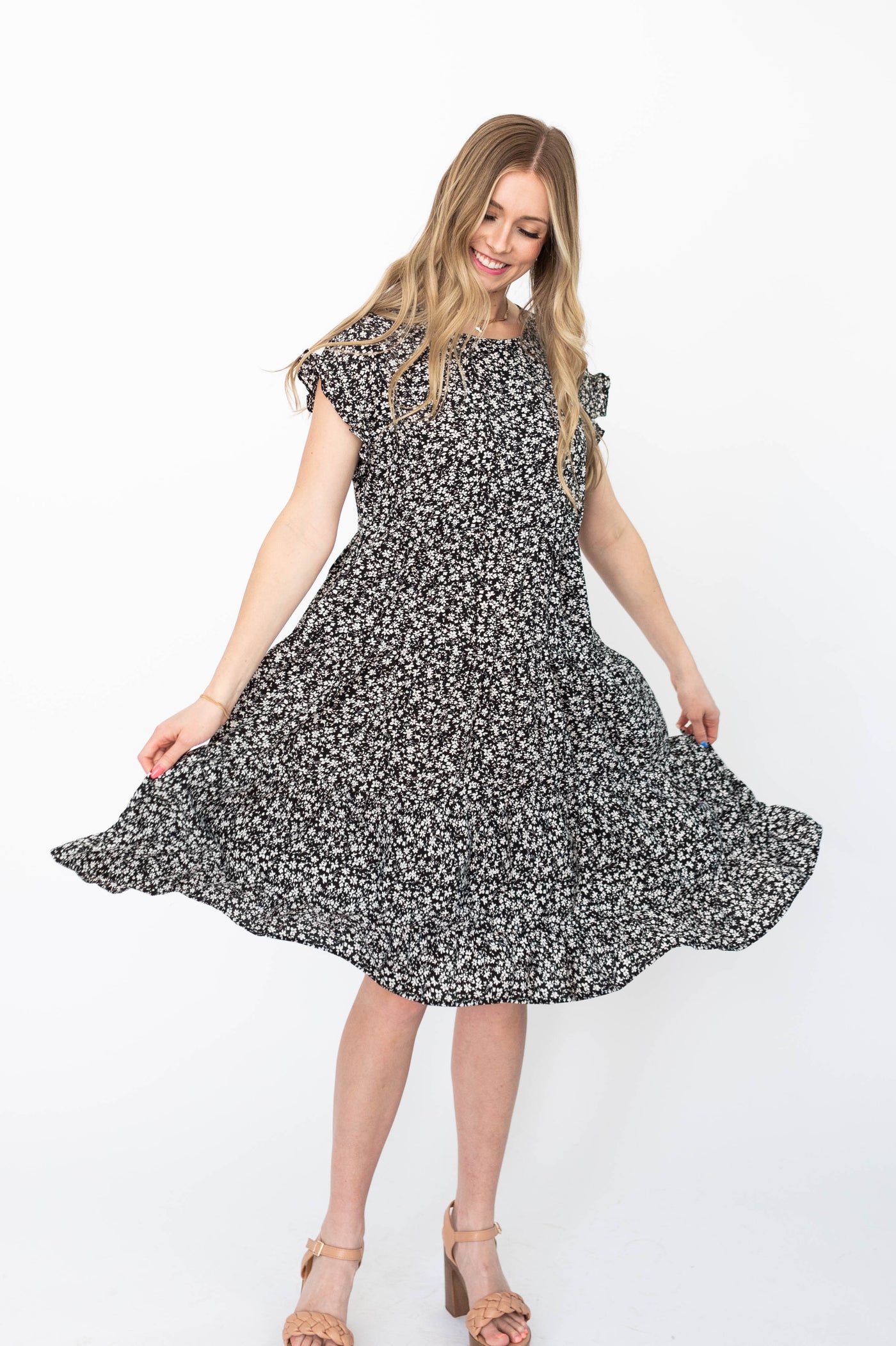 Short sleeve black floral dress with tiered skirt