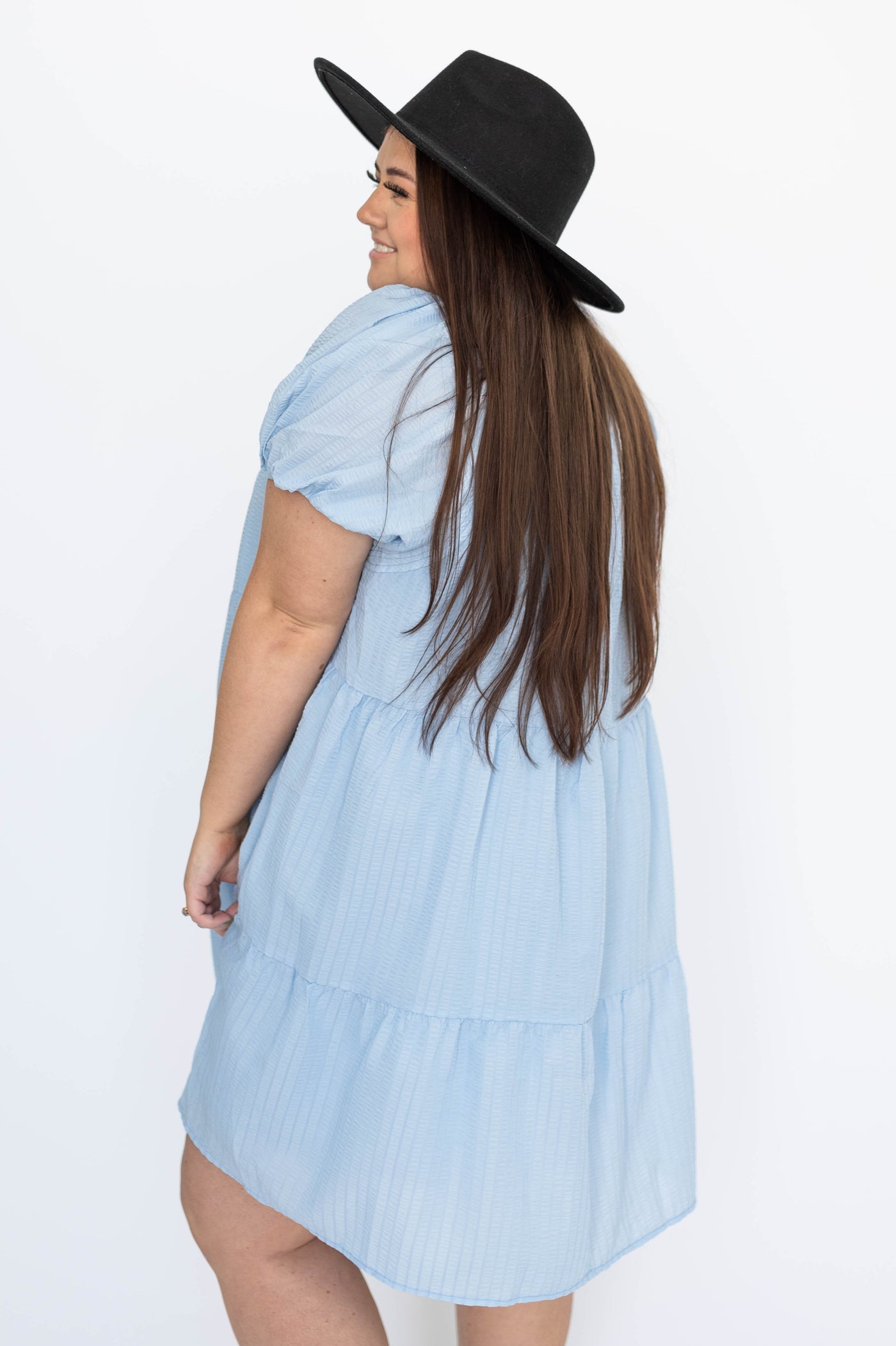 Side view of a light blue dress