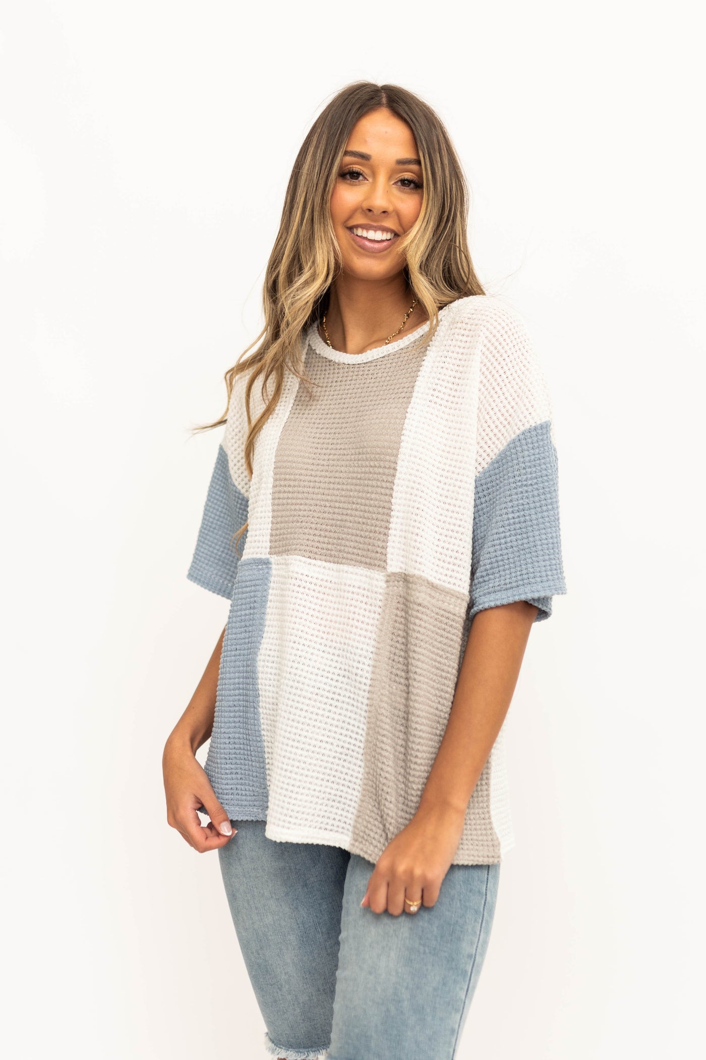 Blue knit top with short sleeves