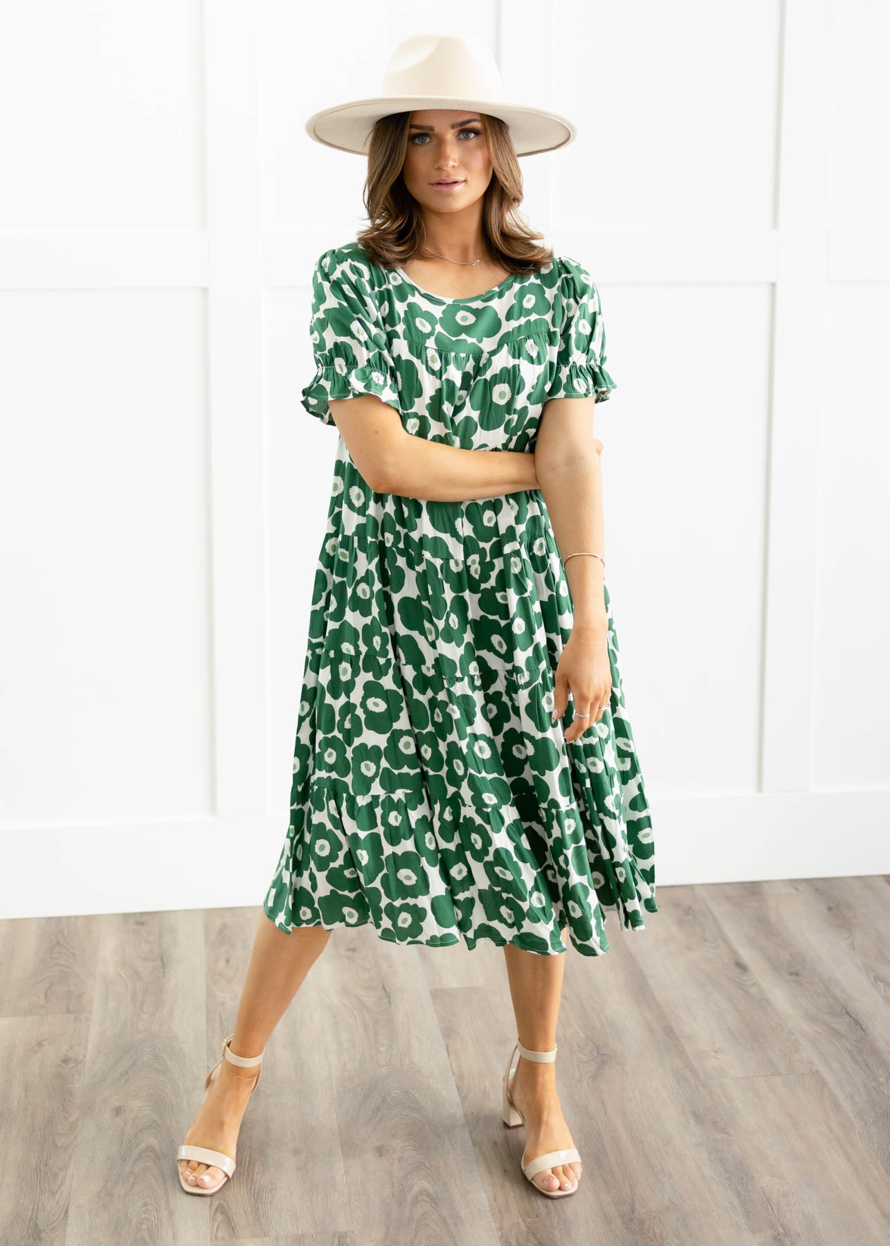 Short sleeve green floral dress with tiered skirt