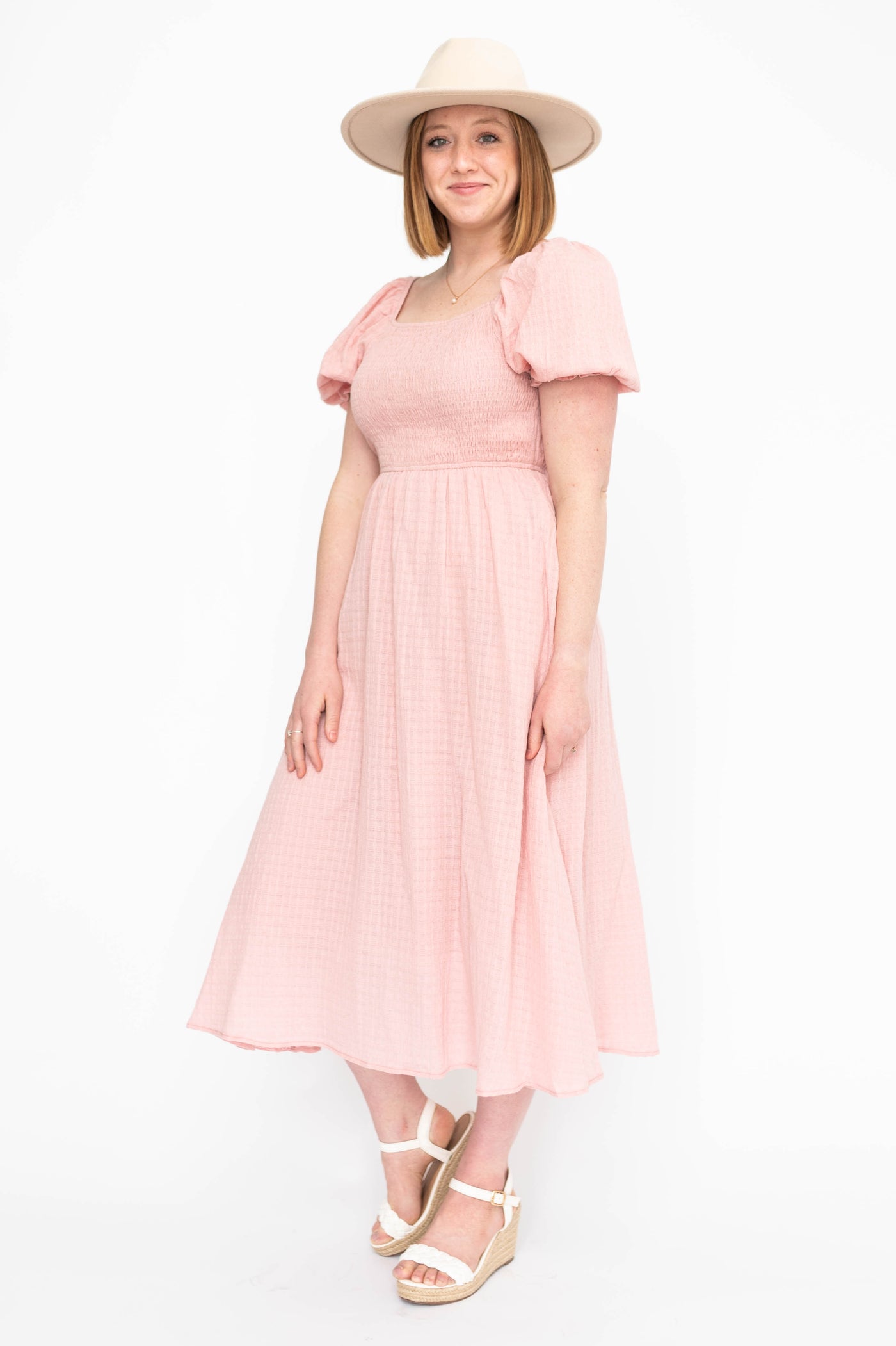 Short sleeve mauve dress with a square neck and smocked bodice