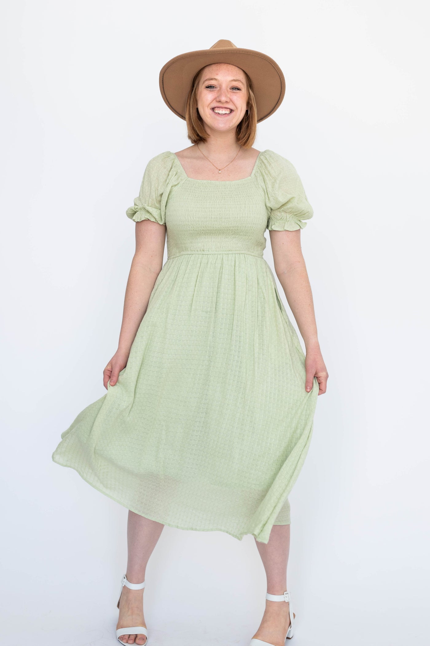 Short sleeve sage dress with smocked bodice