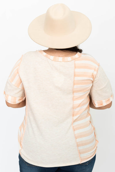 Back view of a plus size oatmeal top