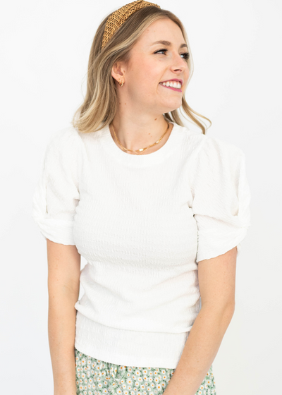 White top with knotted sleeve